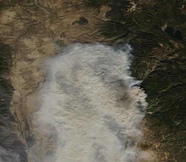 Smoke fills the sky
